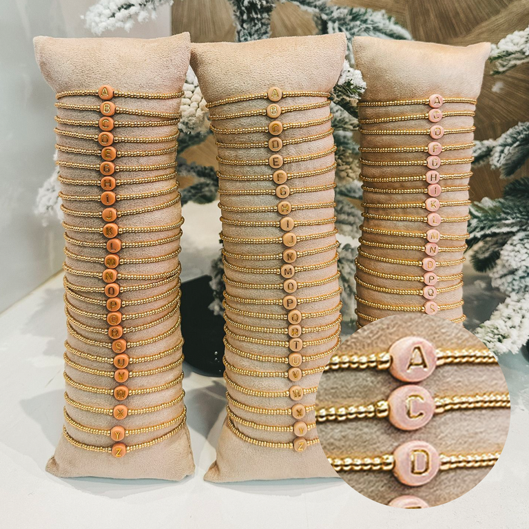 Armband met roze letter | Goud